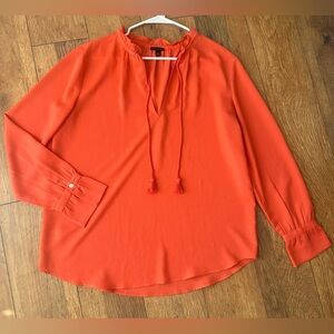 Ann Taylor Vibrant Salmon Colored V-neck Long Sleeved Blouse with Tassel Detail